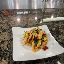 Salmon sushi pizza