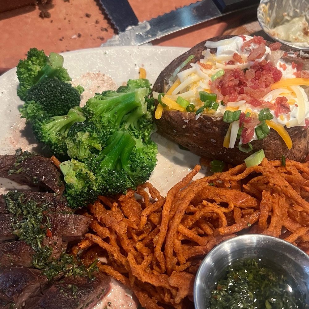 Outback Steakhouse - Delicious chimichurri steak broccoli and fully loaded baked potato - Steakhouses Near Me - Norwalk, California Outback Steakhouse - Delicious chimichurri steak broccoli and fully loaded baked potato - Steakhouses Near Me - Norwalk, California