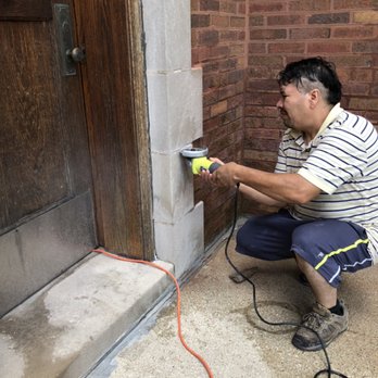Green World Construction - Repairing the bricks and limestone and apply new mortar cement between the bricks - Roofing Near Me - Chicago, Illinois