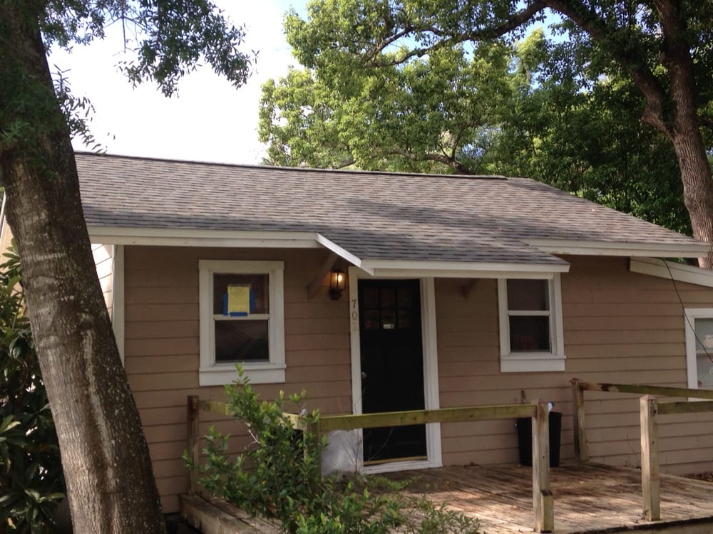 Slide of Ridge Masters Roofing