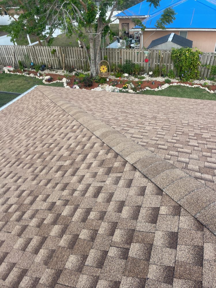 Slide of Walton Roofing