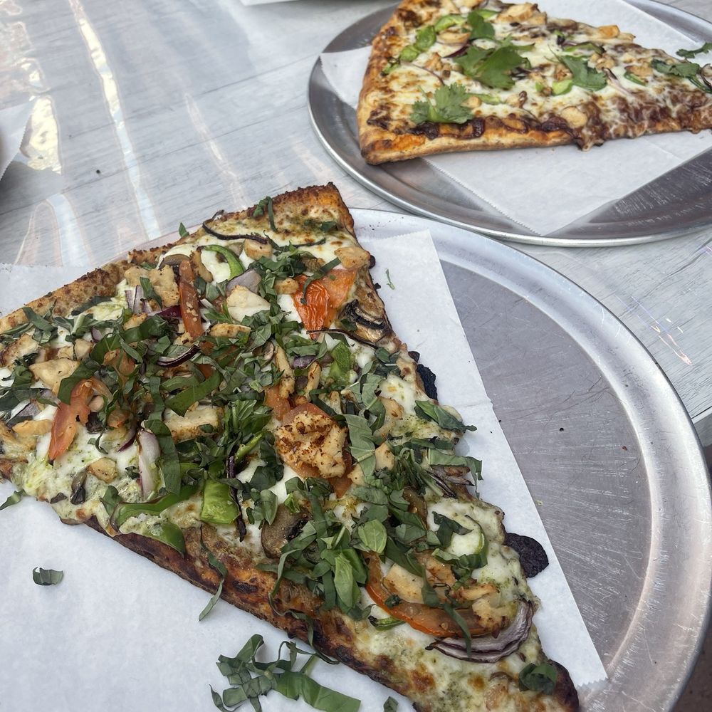 Chicken Pesto Chicken (Solo 8") at the front, BBQ Chicken (Solo 8") middle, and Hawaiian pizza at the back