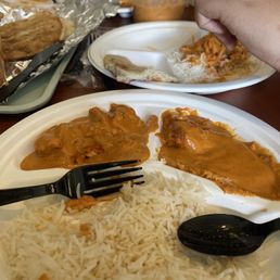 Chicken tiki marsala with rice and naan bread Chicken tiki marsala with rice and naan bread