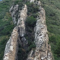 Dense shrubbery at the top. Was previously debating hiking this odd incline.