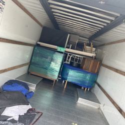 J & J’s Services - A truck with moving contents being loaded into it