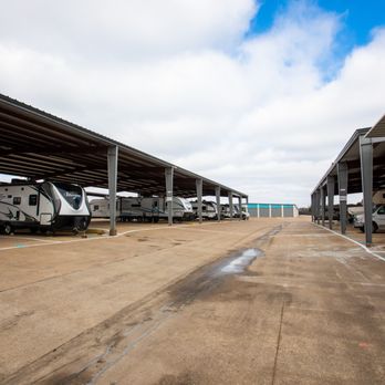 Wylie Bargain Storage - Covered RV storage spaces with wide drive aisles for easy maneuvering at Wylie Bargain Storage in Wylie, TX. - Self Storage Near Me - Wylie, Texas Wylie Bargain Storage - Covered RV storage spaces with wide drive aisles for easy maneuvering at Wylie Bargain Storage in Wylie, TX. - Self Storage Near Me - Wylie, Texas