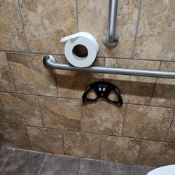 Anytime Fitness - If you're lucky enough to have toilet paper the toilet paper holder is broken