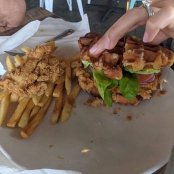 Waterfront Social - Chicken waffle sandwich! Best thing ever!! - Bars Near Me - Crystal River, Florida Waterfront Social - Chicken waffle sandwich! Best thing ever!! - Bars Near Me - Crystal River, Florida