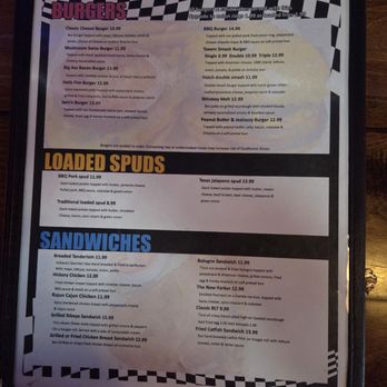 Checkered Flag Tavern - Menu - Menu featuring burger options, loaded spuds, and sandwiches, with prices and descriptions, at a restaurant near the airport. - Pubs Near Me - Indianapolis, Indiana