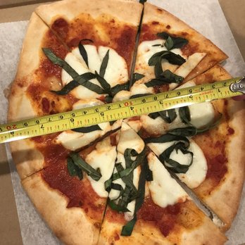 Mazzi's - Their 8" medium Margherita pizza... This is the biggest they will do! Little cheese, all dough. So sad...for $16, $8 okay. $16, NOPE! - Italian Near Me - Eugene, Oregon