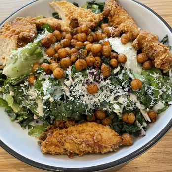 Dish Society - Fried chicken kale ceasar salad with fried chickpeas - Southern Near Me - Austin, Texas Dish Society - Fried chicken kale ceasar salad with fried chickpeas - Southern Near Me - Austin, Texas