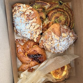 Sub Rosa Bakery - Almond croissant, cherry, pistachio croissant, ham, and cheese soufflé, star croissant with mixed berry - Bakeries Near Me - Richmond, Virginia Sub Rosa Bakery - Almond croissant, cherry, pistachio croissant, ham, and cheese soufflé, star croissant with mixed berry - Bakeries Near Me - Richmond, Virginia