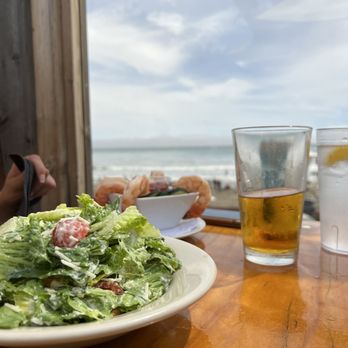 Schooners - a plate of salad and a glass of beer - Seafood Near Me - Cayucos, California