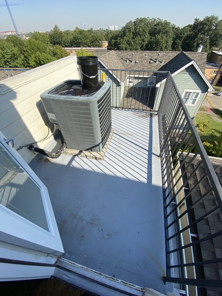 Slide of Quality King Roofing