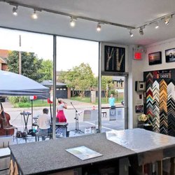 PAZAN GALLERY - Interior image of our design area on a day we had a festival on the streets. Our large windows allow us to match colour precisely.