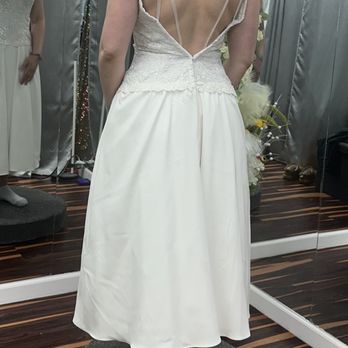 Donna Bridals - Back of dress. No way the thick fabric would lay flat, but she insisted,  Ruined a family heirloom and overcharged - Sewing & Alterations Near Me