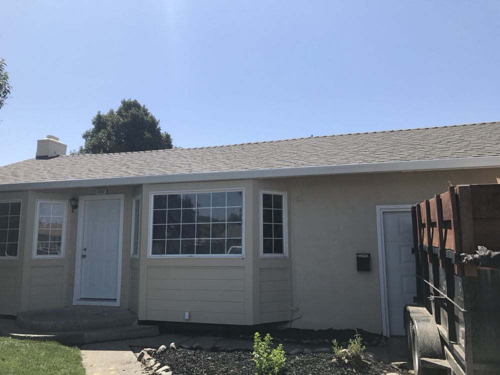 Slide of T&K Roofing