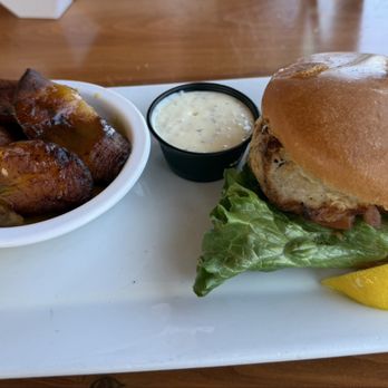 Conchy Joe's - Mahi sandwich with mango plantains - Seafood Near Me - Jensen Beach, Florida Conchy Joe's - Mahi sandwich with mango plantains - Seafood Near Me - Jensen Beach, Florida
