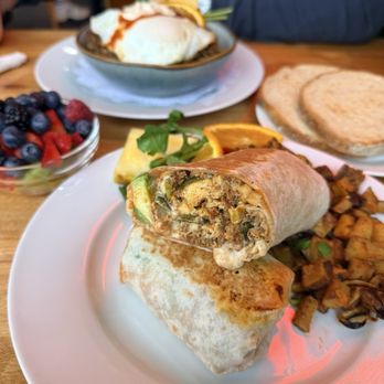 Portage Park Breakfast Place - Breakfast burrito, side of fruit, carnitas skillet, sourdough toast - Breakfast & Brunch Near Me - Chicago, Illinois Portage Park Breakfast Place - Breakfast burrito, side of fruit, carnitas skillet, sourdough toast - Breakfast & Brunch Near Me - Chicago, Illinois