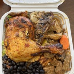 Fogon Latino - Chicken leg , beef ribs, pork, rice with beans... Was as good as it looks!