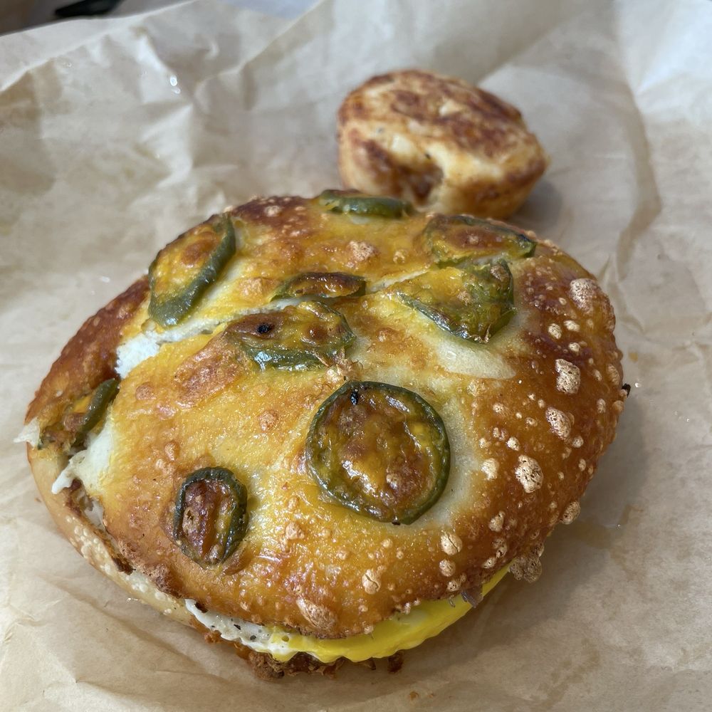 Einstein Bros. Bagels - Texas Brisket Egg Sandwich on Jalapeño bun - Breakfast & Brunch Near Me - Houston, Texas Einstein Bros. Bagels - Texas Brisket Egg Sandwich on Jalapeño bun - Breakfast & Brunch Near Me - Houston, Texas