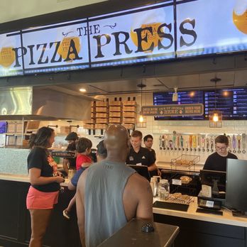 The Pizza Press - Food pickup counter - Pizza Near Me - Winter Garden, Florida The Pizza Press - Food pickup counter - Pizza Near Me - Winter Garden, Florida