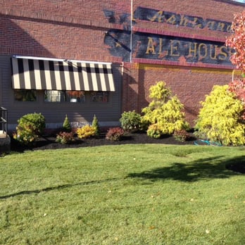 Robinson Landscaping - a brick building with awnings - Landscape Architects or Designers Near Me - MEDWAY, Massachusetts Robinson Landscaping - a brick building with awnings - Landscape Architects or Designers Near Me - MEDWAY, Massachusetts