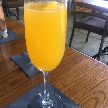 The Raymond 1886 - Mimosa With House made Curacao - New American Near Me - Pasadena, California The Raymond 1886 - Mimosa With House made Curacao - New American Near Me - Pasadena, California