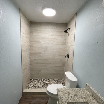 Grace Tile Remodeling - a walk in shower - Flooring Near Me