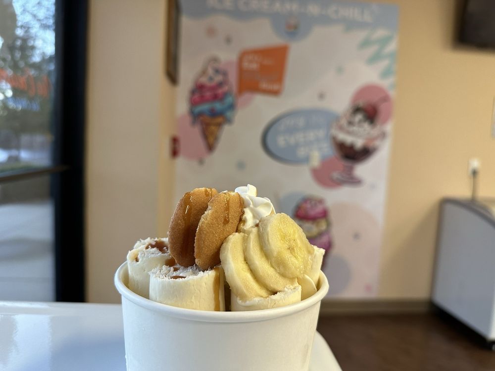 Ice Cream Lounge & Caribbean Grill Logo