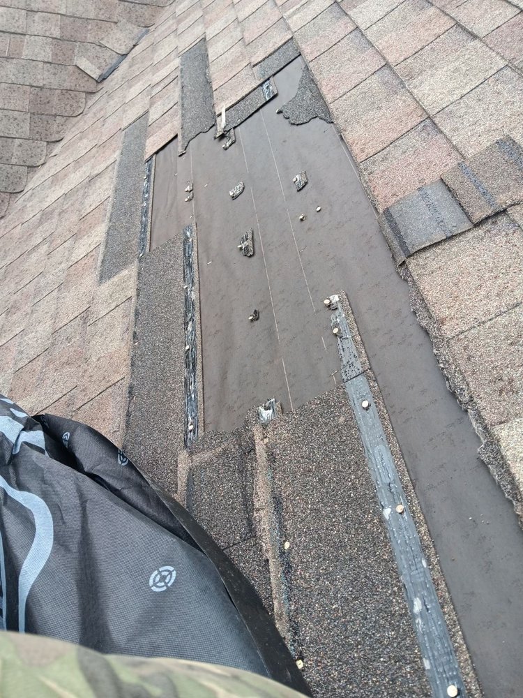 Slide of C&M Roofing