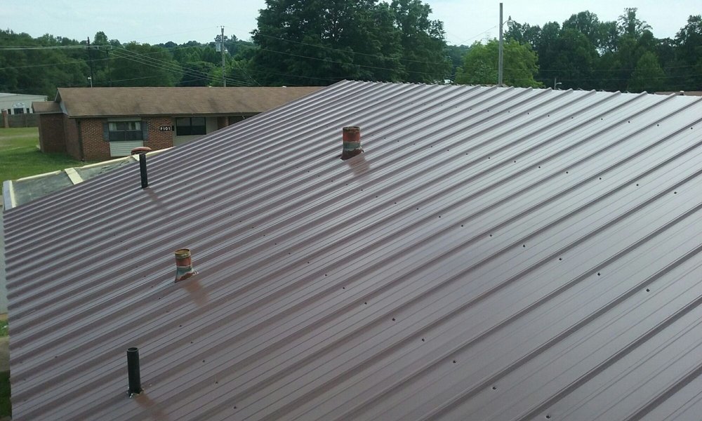 Slide of Tim's Roofing