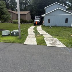 JKE Contracting - Protecting lawn to enter with equipment