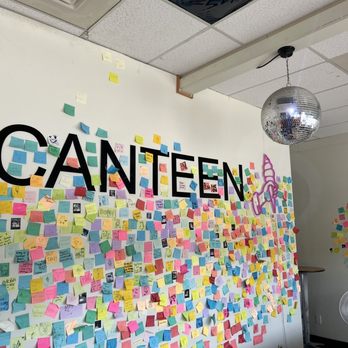 Canteen Creemee - a wall covered with post it notes - Burgers Near Me - Waitsfield, Vermont