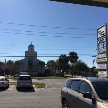 The Book Rack - Green-domed church building is across the street. - Bookstores Near Me - Fort Walton Beach, Florida