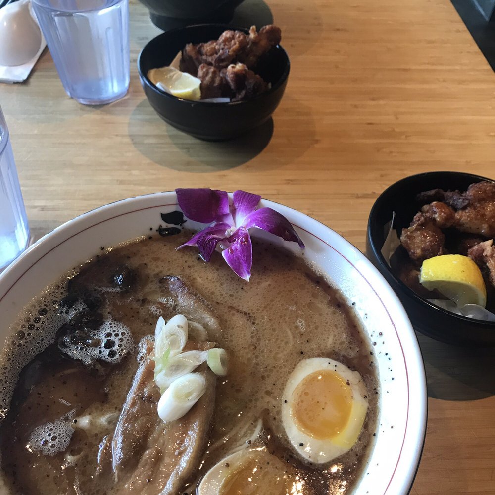 Sansotei Ramen - Miso Black + Zangi. Tonkotsu black in the back. Don't forget to eat the flower. - Japanese Near Me - Markham, Ontario Sansotei Ramen - Miso Black + Zangi. Tonkotsu black in the back. Don't forget to eat the flower. - Japanese Near Me - Markham, Ontario