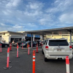 McCully Union Service - The orange delineator posts--marks off the areas for cars to line up.