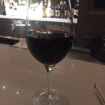 Conservatory Cafe - a glass of red wine on a bar counter - Cafes Near Me - Nashville, Tennessee Conservatory Cafe - a glass of red wine on a bar counter - Cafes Near Me - Nashville, Tennessee