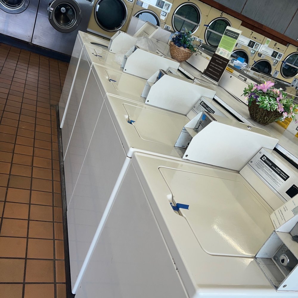 Wash King Coin Laundry - 4/5 dryers in a row not working and more in background taped off as well - Laundromat Near Me - Hastings, Michigan Wash King Coin Laundry - 4/5 dryers in a row not working and more in background taped off as well - Laundromat Near Me - Hastings, Michigan