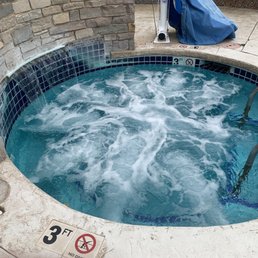 One of 2 outdoor hot tubs One of 2 outdoor hot tubs