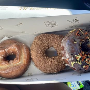 Sidecar Doughnuts & Coffee - (Left to right) Old Fashion, Saigon Cinnamon Crumb, Celebration Cake. - Donuts Near Me - Costa Mesa, California Sidecar Doughnuts & Coffee - (Left to right) Old Fashion, Saigon Cinnamon Crumb, Celebration Cake. - Donuts Near Me - Costa Mesa, California