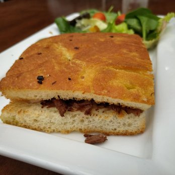 Café Jennie - a sandwich on a plate with a salad - Breakfast & Brunch Near Me - Ithaca, New York Café Jennie - a sandwich on a plate with a salad - Breakfast & Brunch Near Me - Ithaca, New York