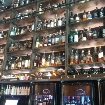 Flight West - Behind the bar: nice display - Cocktail Bars Near Me - Rochester, New York