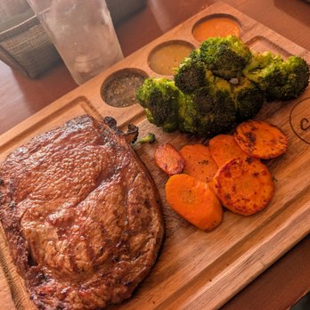 S&T Steak House - Ribeye steak with grilled veggies. - Steakhouses Near Me - Chicago, Illinois