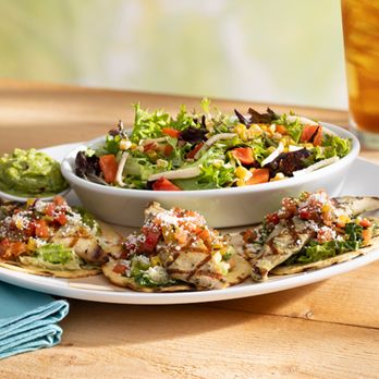 Seasons 52 - Wood-Grilled Steak Tacos served with taco slaw, pico de gallo, cotija, avocado and lime. - New American Near Me - Memphis, Tennessee