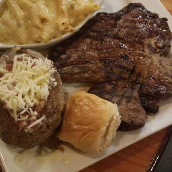 Borderland Steakhouse - Porter house steak with a loaded baked potato and Mac con Queso - Steakhouses Near Me - El Paso, Texas Borderland Steakhouse - Porter house steak with a loaded baked potato and Mac con Queso - Steakhouses Near Me - El Paso, Texas