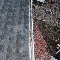 All Weather Seamless Raingutters - Before a gutter clean out. Gutters have leaves, debris and dirt built up.