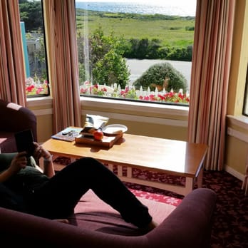 White Water - Me reading a book from the comfy sitting area in cottage 1. Look at that view! - Hotels Near Me - Cambria, California White Water - Me reading a book from the comfy sitting area in cottage 1. Look at that view! - Hotels Near Me - Cambria, California