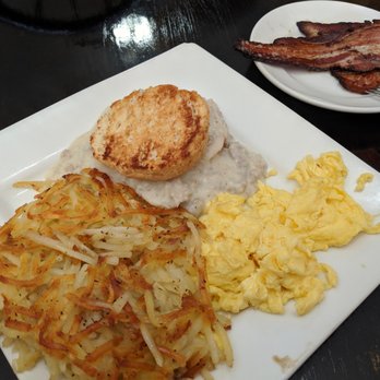 Berry Sweet Kitchen - "Egg with biscuit and gravy" entree and side of bacon. - Cafes Near Me - Minneapolis, Minnesota