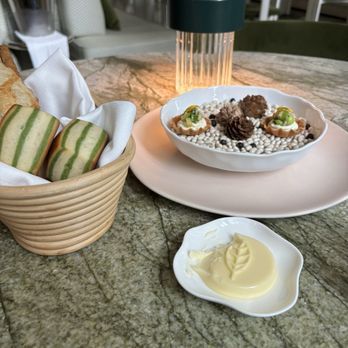 Le Jardinier - Bread and a delicious surprise starter. - French Near Me - New York, New York